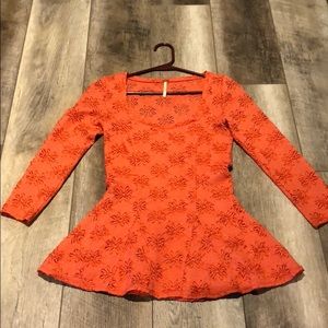 Orange eyelet Free People peplum shirt